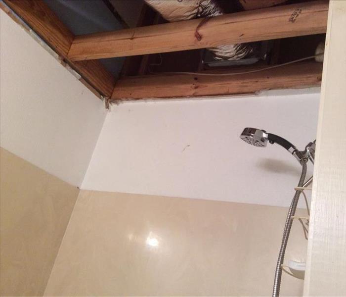 Bathroom ceiling with studs exposed
