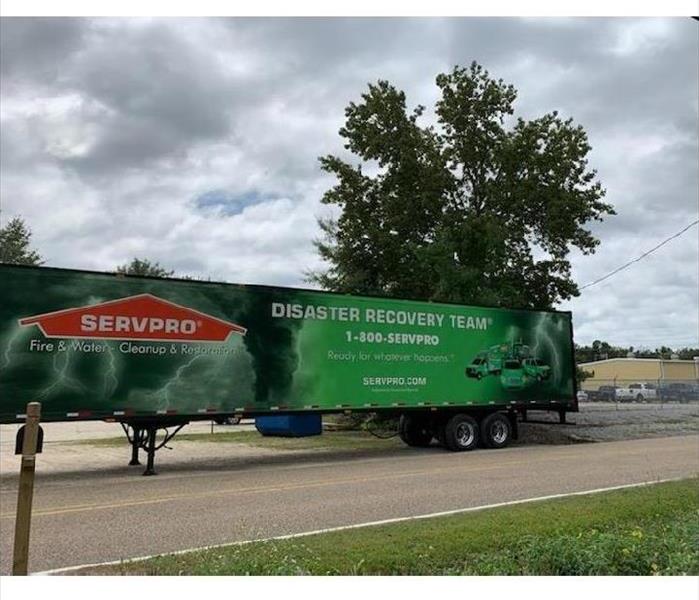 SERVPRO semi-truck trailer; SERVPRO facility in background