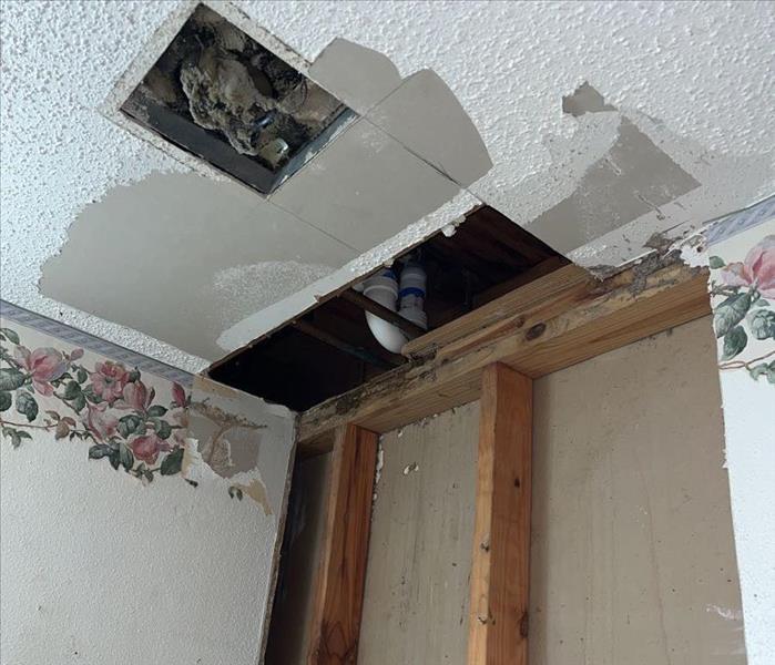 Partial drywall removal from a wall and ceiling