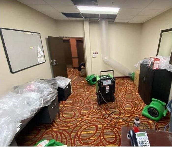 SERVPRO restoration equipment being used in water damaged commercial property