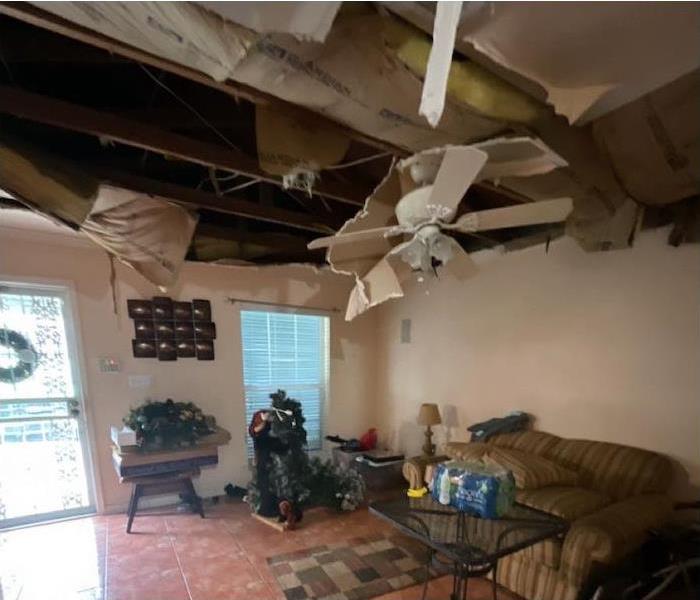 living room ceiling with fire damage