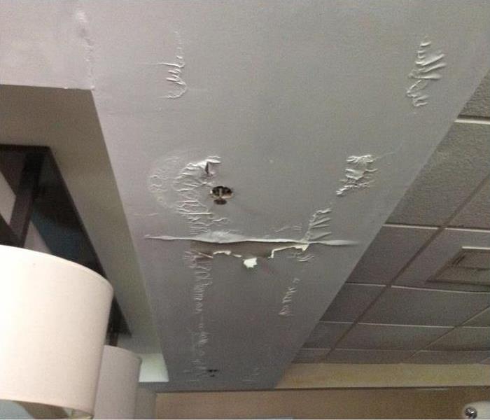 paint on ceiling peeling and bubbling after water damage