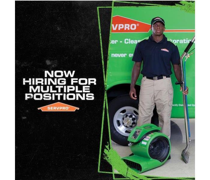 male employee holding a hose with a caption that says "Now Hiring for multiple positions"